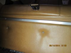 Remove front trim from below rear seat.