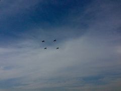 Mooney over Cessna assembly field Oshkosh 2014