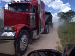 photo truck delivering caliche