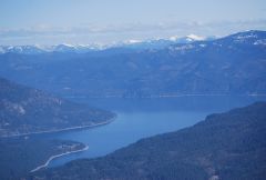 Lake Pend Oreille and snow covered Rocky Mountains towards Glacier Park