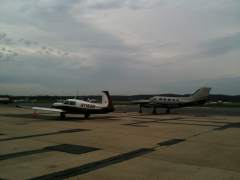 Parked at FDK next to Chuck's Cessna 414 - his Mooney is to the right in the background