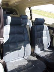 leather fully adjustable seats with fold-down rear seats.