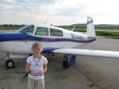 Madeline at personal inspection of plane in La Crosse