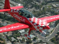 Me in the front seat, riding with Oracle stunt plane pilot