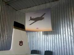 Hangar Art - Banner that I had made from a Mooney Wallpaper photo.