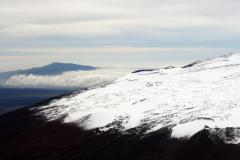 Slopes of Mauna Kea with Hualalai in background.