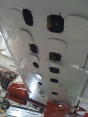 Inspection panels removed from left wing.  Interesting that not all the panels have screws.  About half are riveted.