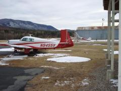 My new Mooney m20e and my old Cessna 140 in the background.