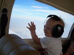 My 10 month old enjoying his Mooney ride to the beach