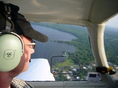 Flying over Palatka, FL, and the St Johns River on the way to 28J (Kay Larkin). Check out their new facility and cheap fuel