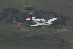 Becca flying it back from Brenham for an engine change.