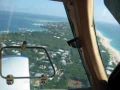 Flying over Harbour Island after departing to come home