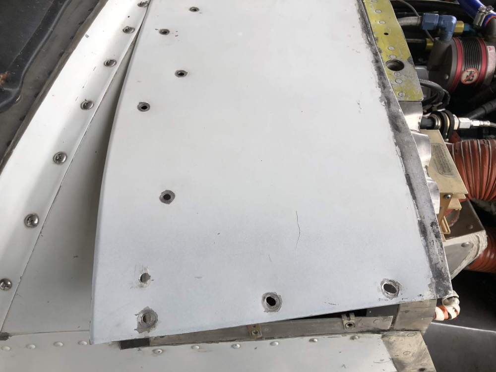 worn_holes_instrument_bay_panel.jpg